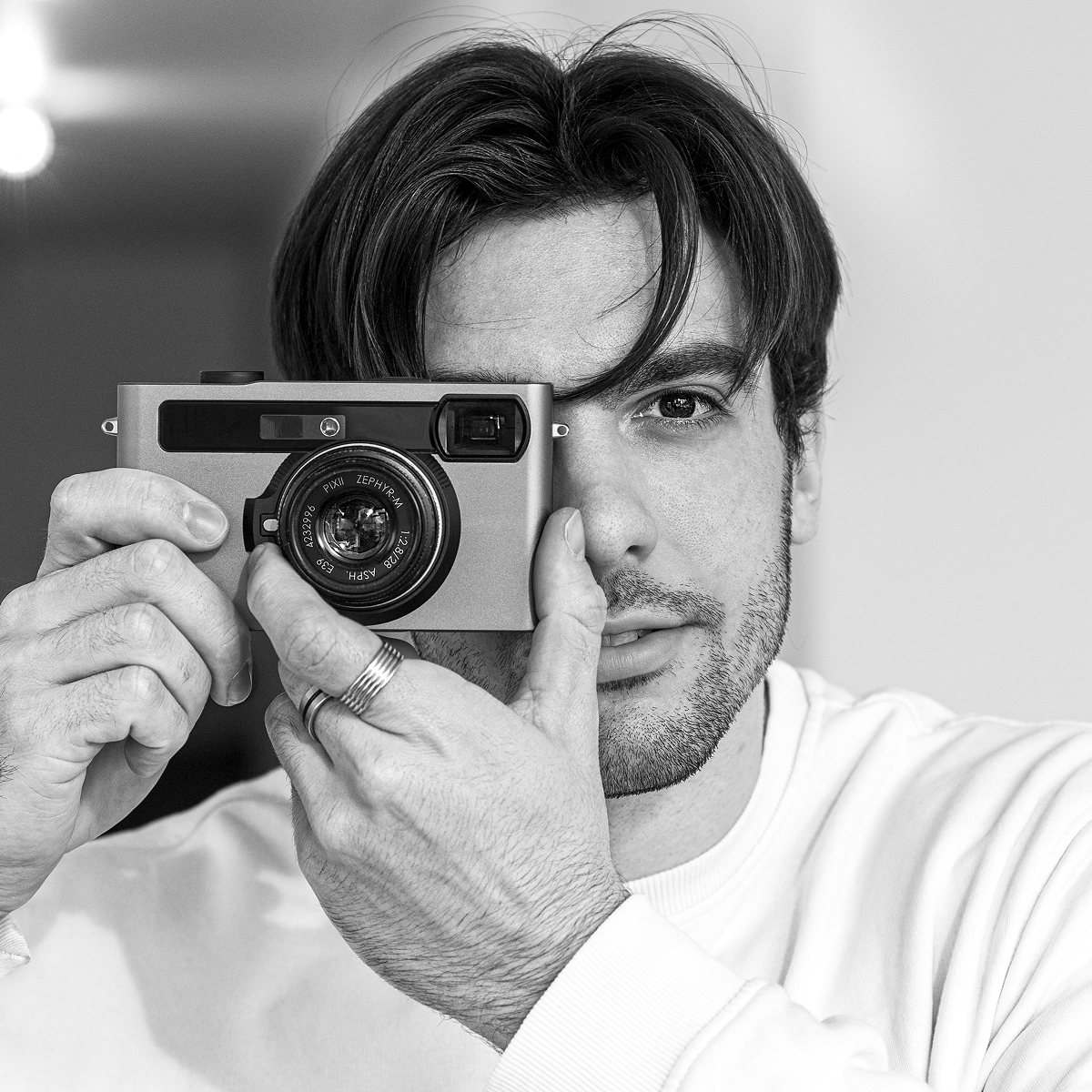 A photographer with Pixii